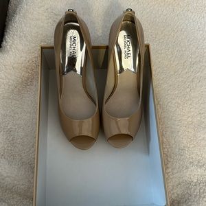 Tan patent leather pumps
